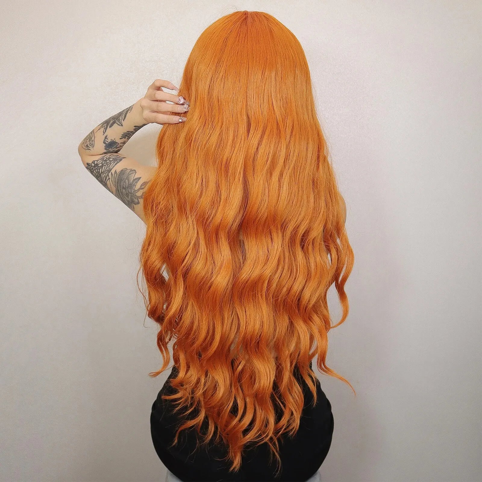 Long Water Wave Orange Synthetic Wigs for Women Wavy Natural Hair Wigs with Long Bangs Cosplay Party Wigs Heat Resistant