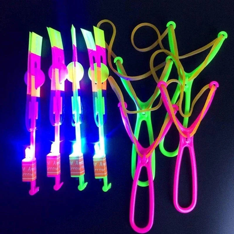 1-50Pcs Amazing Light Toys Arrow Rocket Helicopter Flying Toy LED Luminous Toys Party Fun Gifts Rubber Band Catapult Novelty Toy