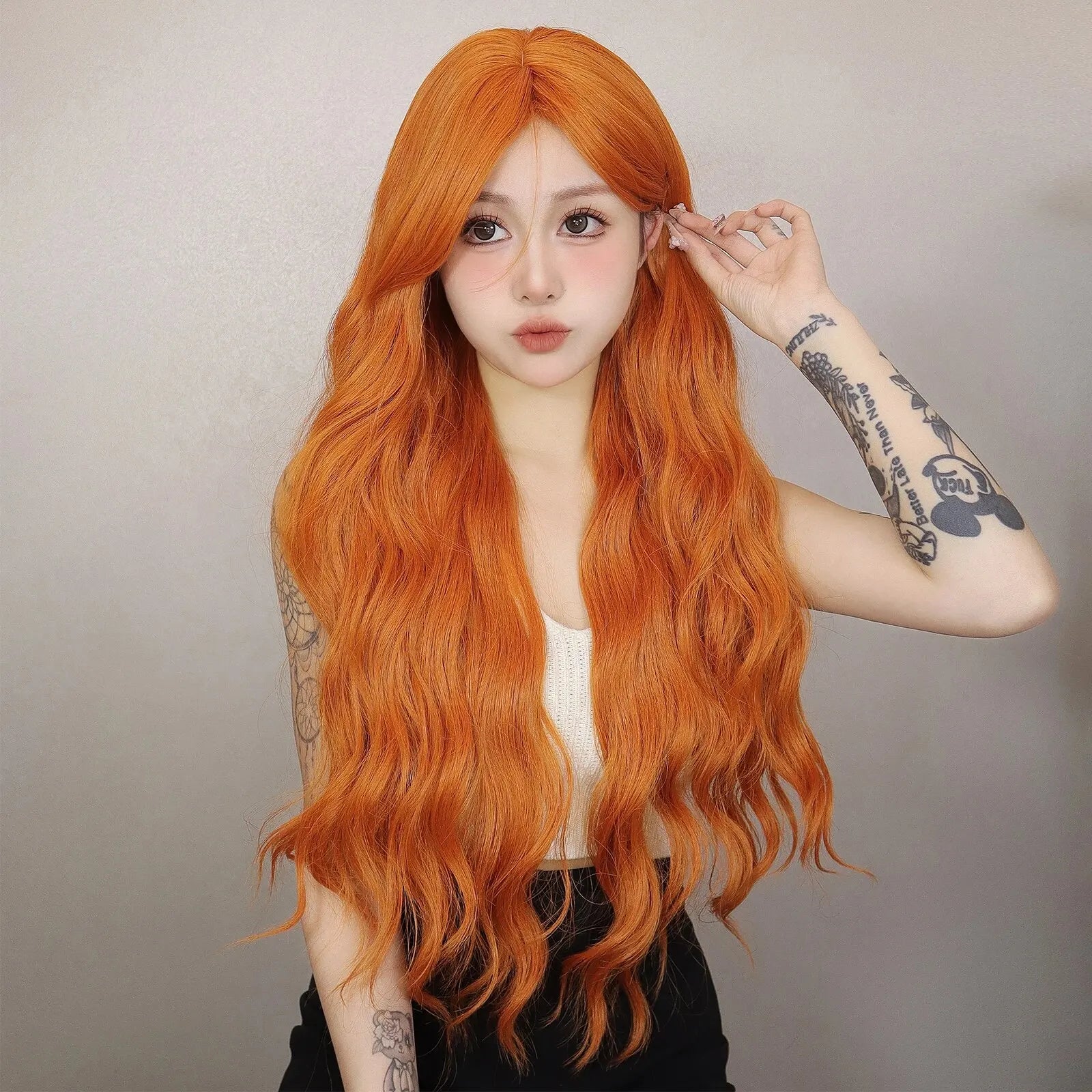 Long Water Wave Orange Synthetic Wigs for Women Wavy Natural Hair Wigs with Long Bangs Cosplay Party Wigs Heat Resistant